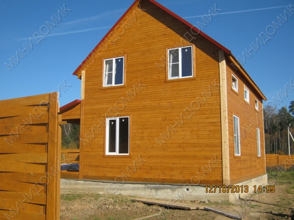 Дом из бруса с террасой 7х9,5 м